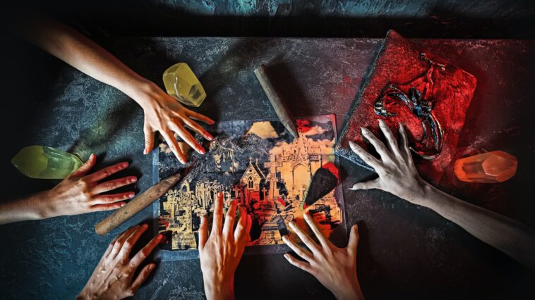 Top view of hands in quest game. Solving a puzzle during riddle.